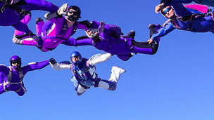sky divers creating circle - middle focus